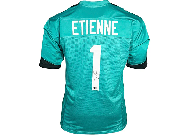 Travis Etienne Signed Jacksonville Custom Teal Football Jersey (Beckett)