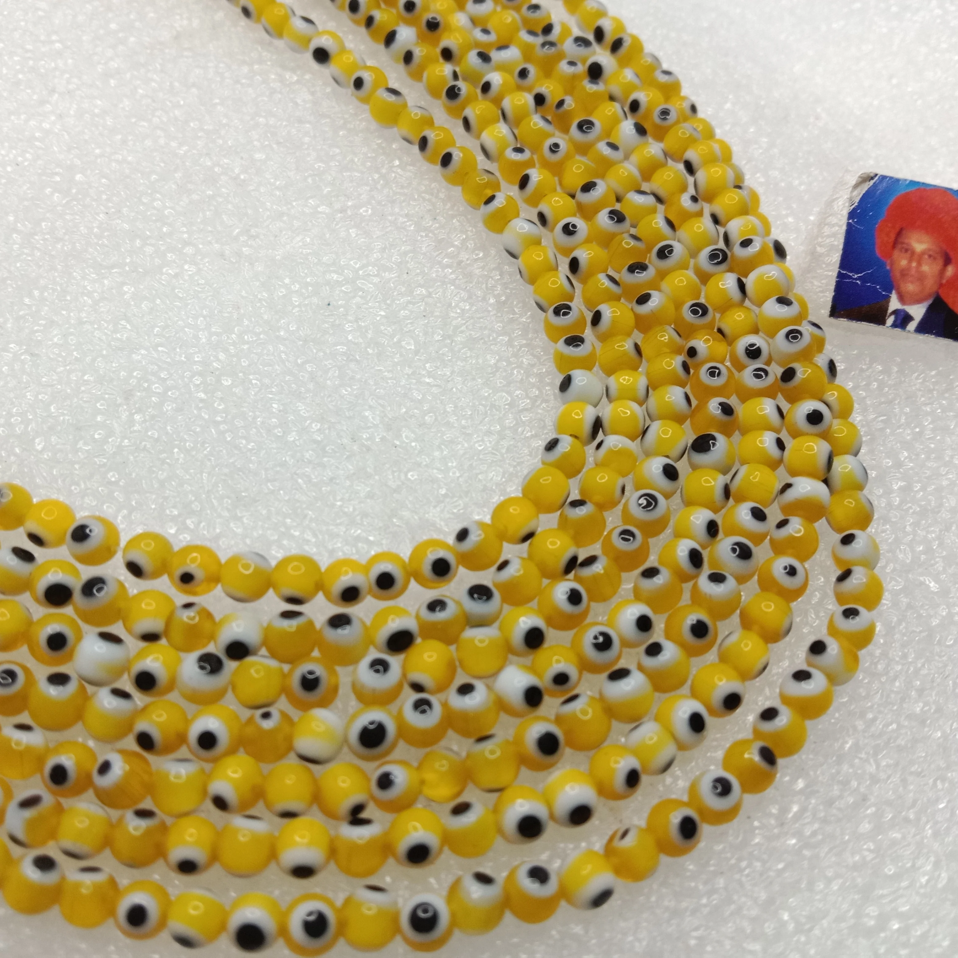 Yellow Evil eye round shape beads 4mm 1 string