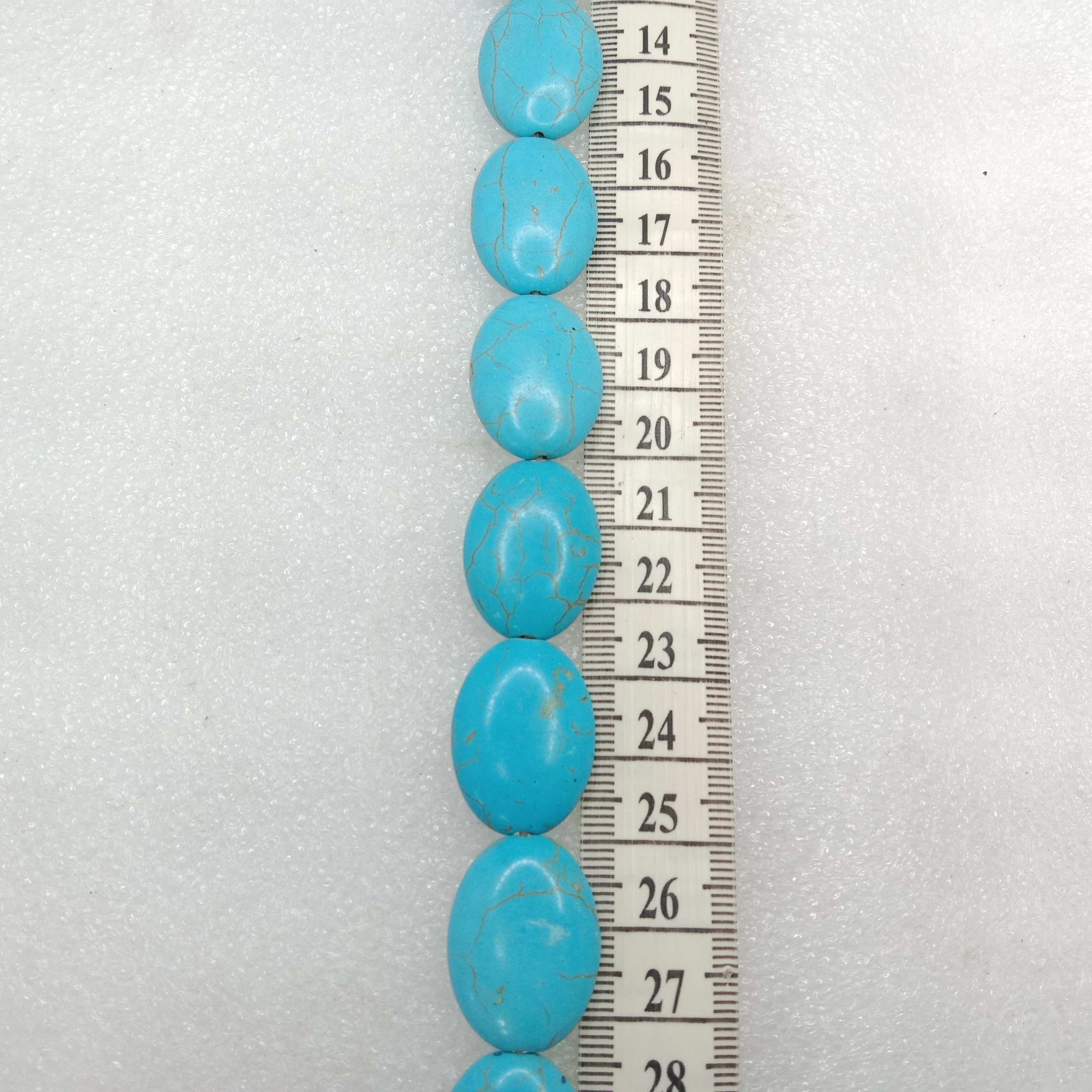 Flat puffed oval shape turquoise beads 1 string