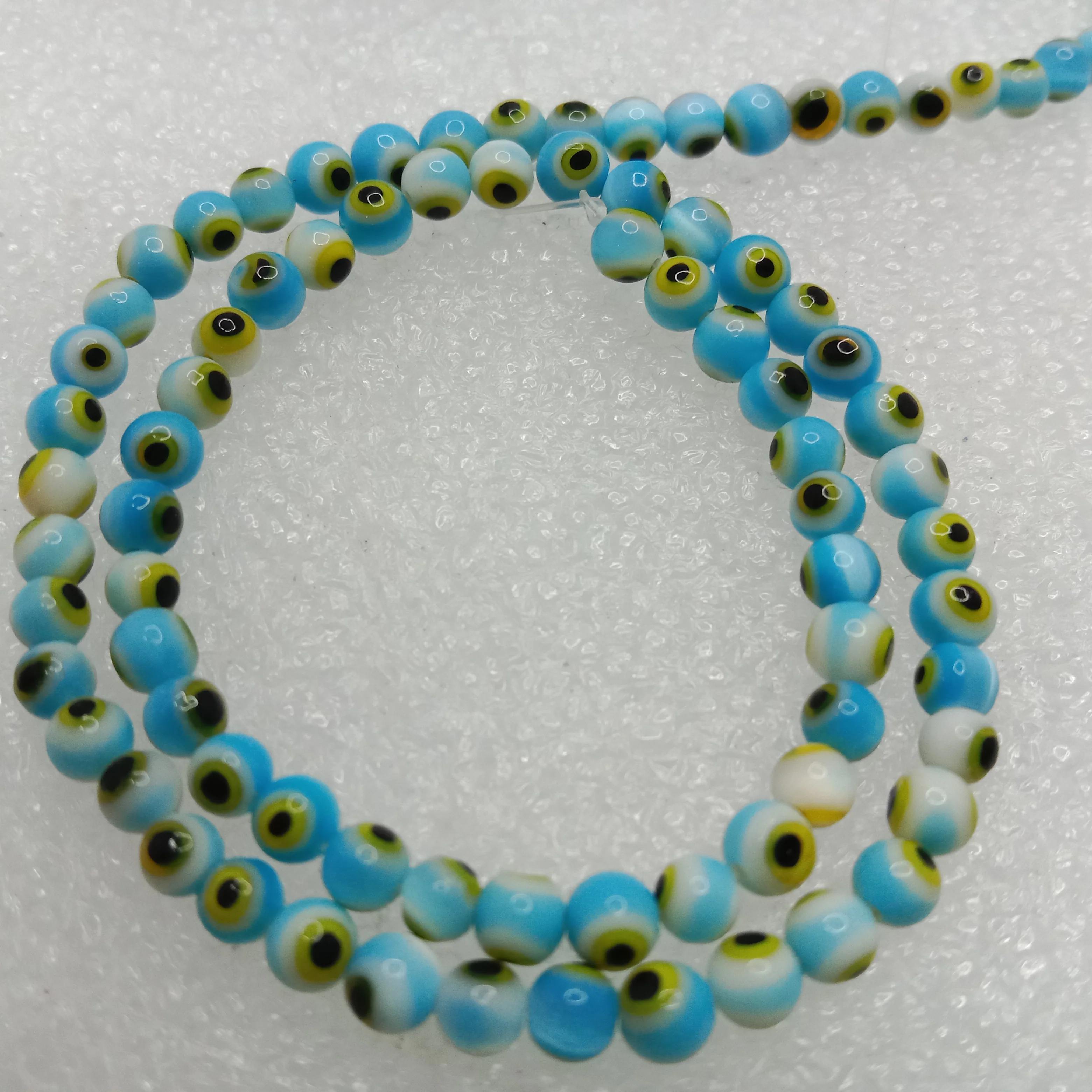 Sea blue Evil eye round shape beads 4mm 1 string