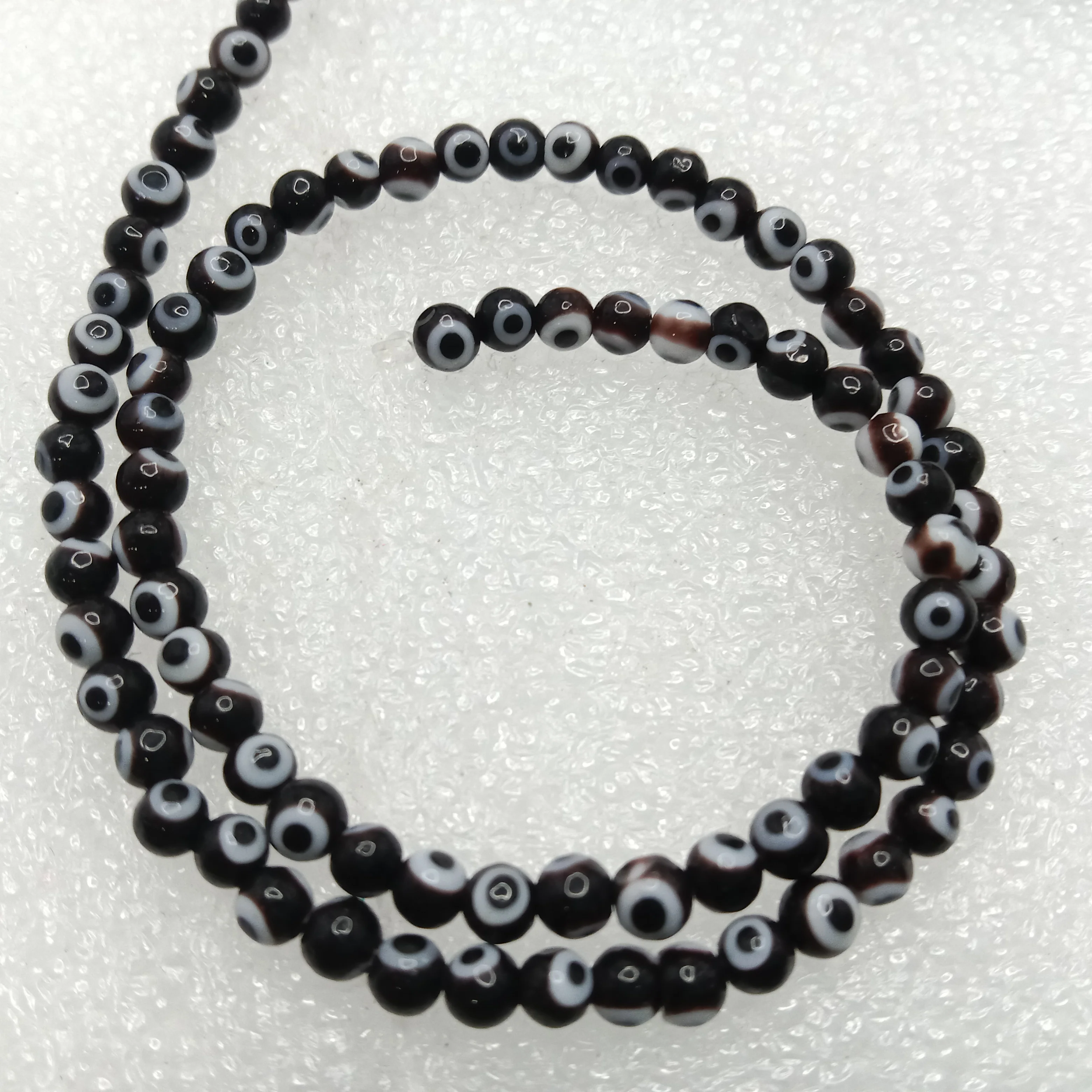 black Evil eye round shape beads 4mm 1 string