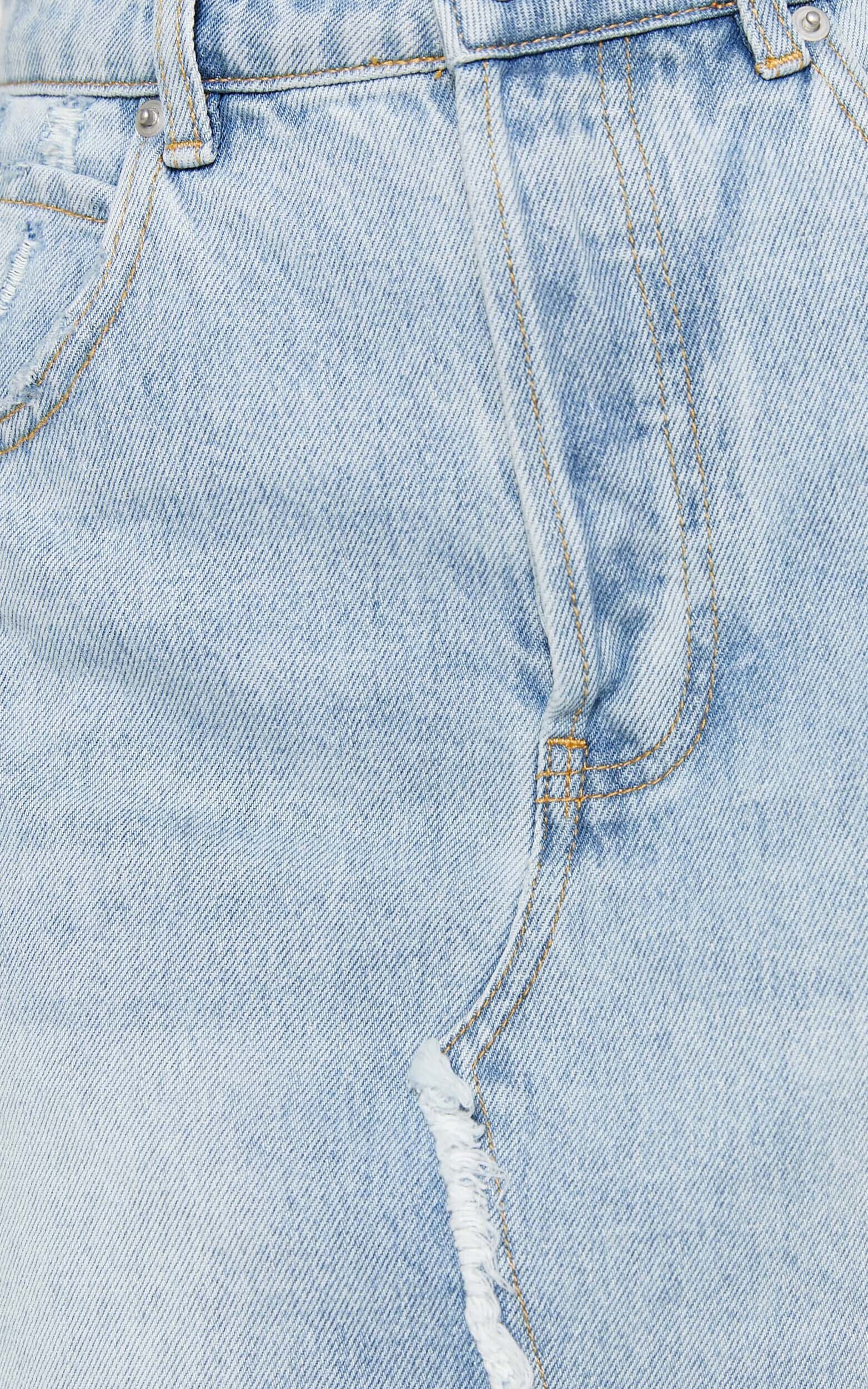 Pieta Mini Skirt - Recycled Cotton Raw Hem Denim Skirt in Mid Blue Wash