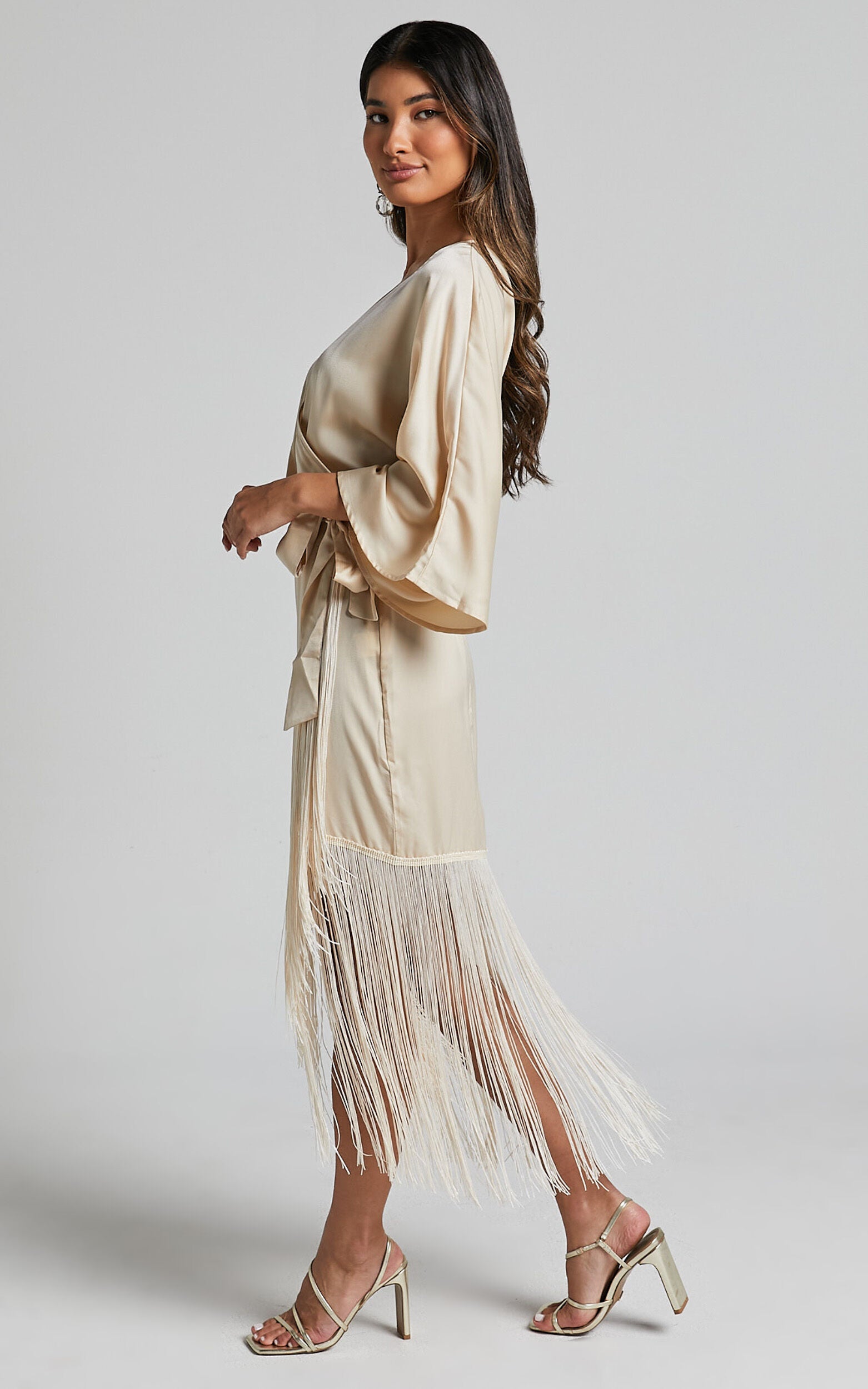 Harlen Midi Dress - V Neck 3/4 Sleeve Asymmetric Fringe Hem Wrap Dress in Champagne