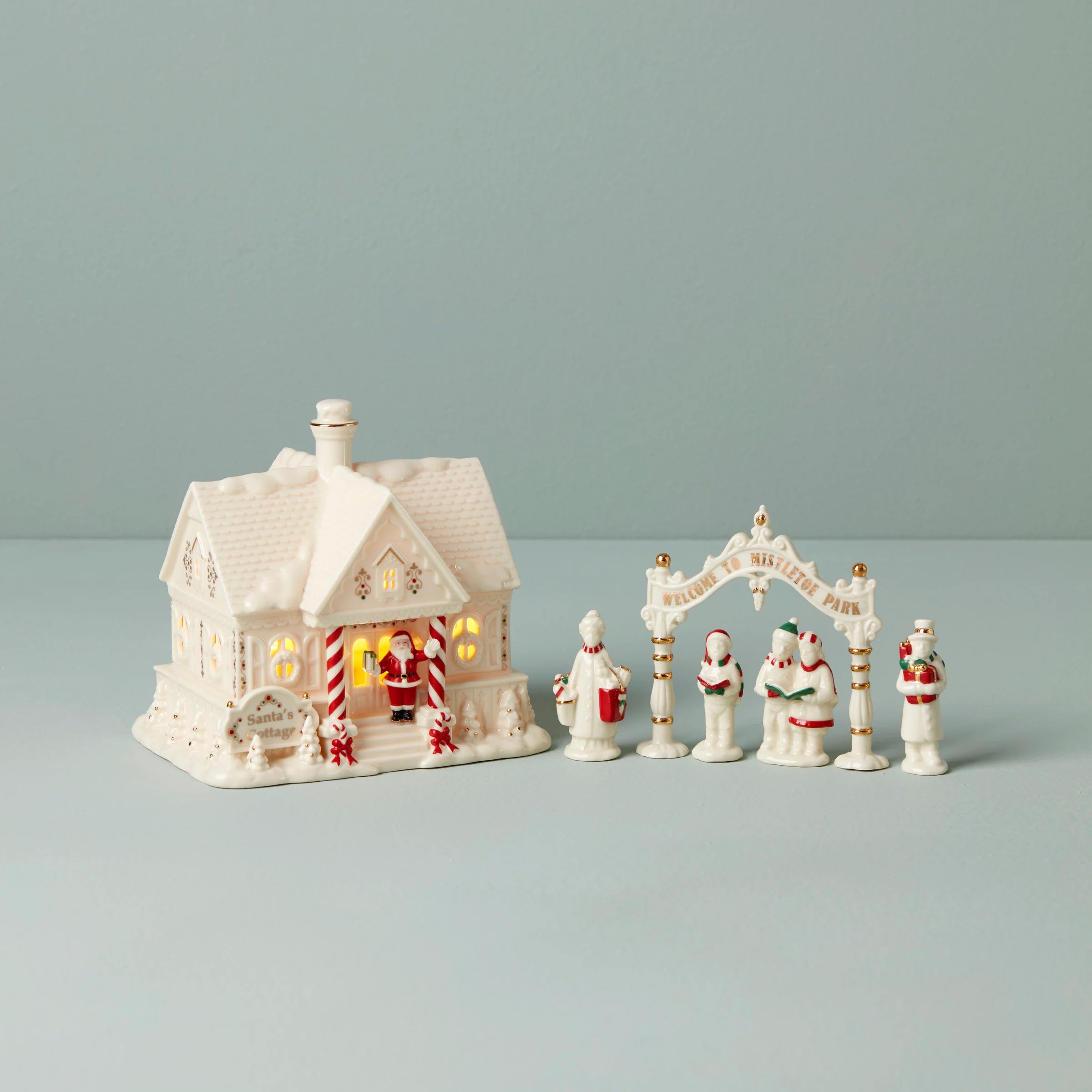 Mistletoe Park Light-Up Cottage & Caroler Figurine