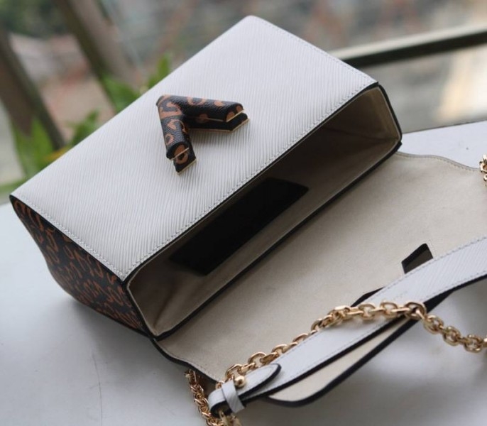 Louis Vuitton Epi Leather Jungle Edition Twist MM Bag In Optic White