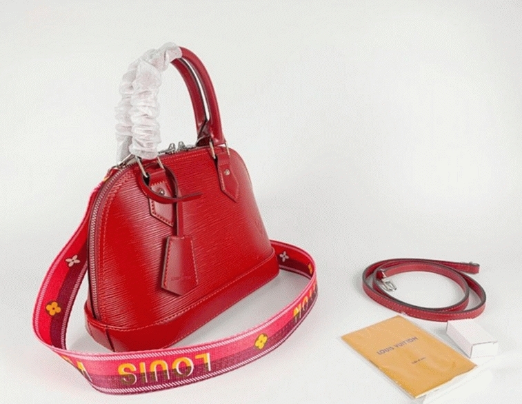 Louis Vuitton Epi Leather Alma BB Handbag In Red With Jacquard Strap