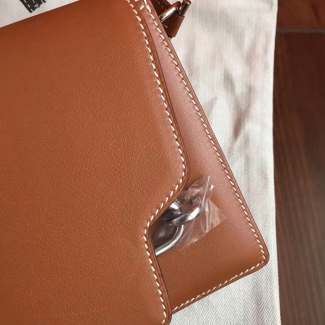 Caramel replica Hermes Mini Sac Roulis handbag