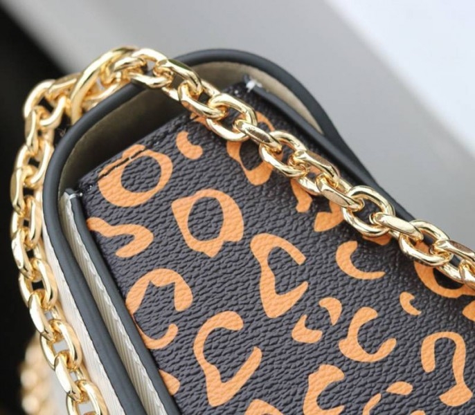 Louis Vuitton Epi Leather Jungle Edition Twist MM Bag In Optic White
