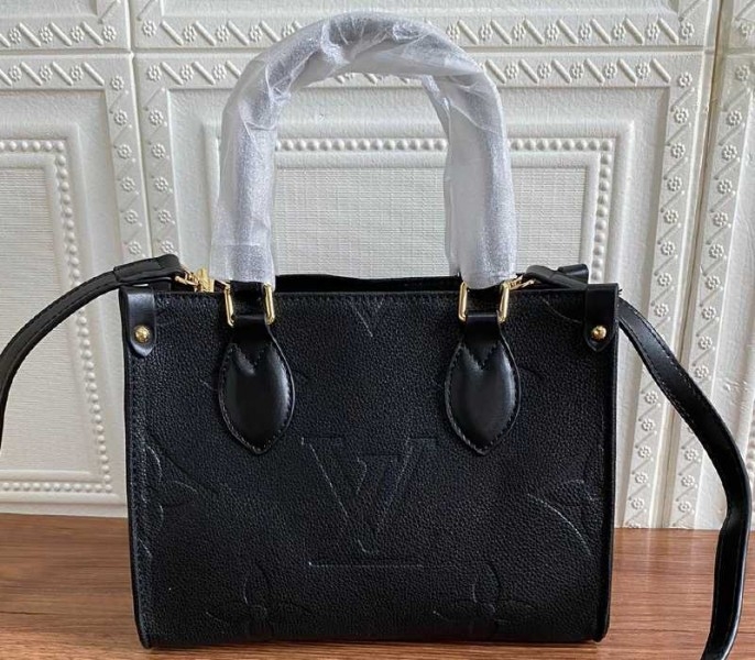 Louis Vuitton Monogram Empreinte Leather Onthego PM Bag In Black