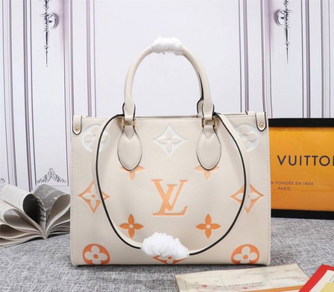 Louis Vuitton Monogram Empreinte Leather Onthego MM Bag In Cream Saffron