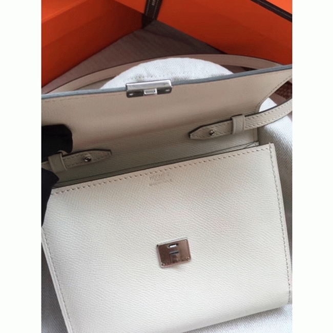 White top knockoff Hermes Clic wallet with strap
