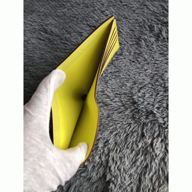 Yellow knockoff Hermes Copernic compact wallet