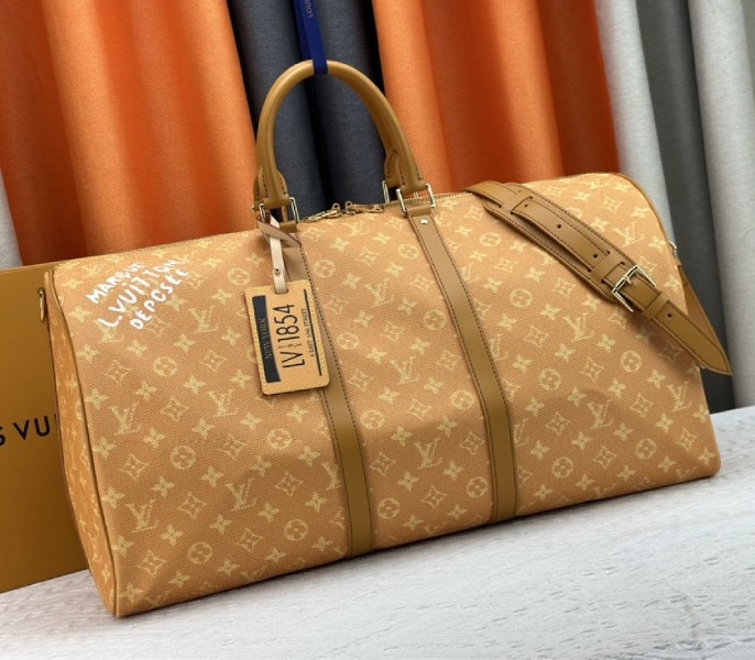 Louis Vuitton Monogram Heritage Canvas Keepall Bandouliere 55 In Yellow