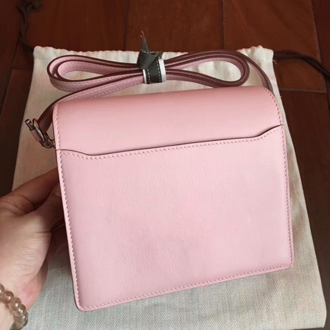 Rose dragee replica Hermes Mini Sac Roulis handbag