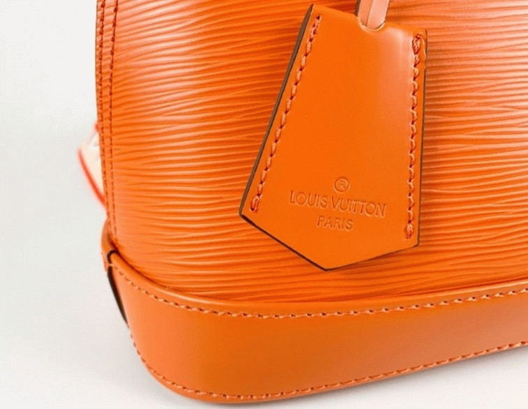 Louis Vuitton Epi Leather Alma BB Handbag In Orange With Jacquard Strap