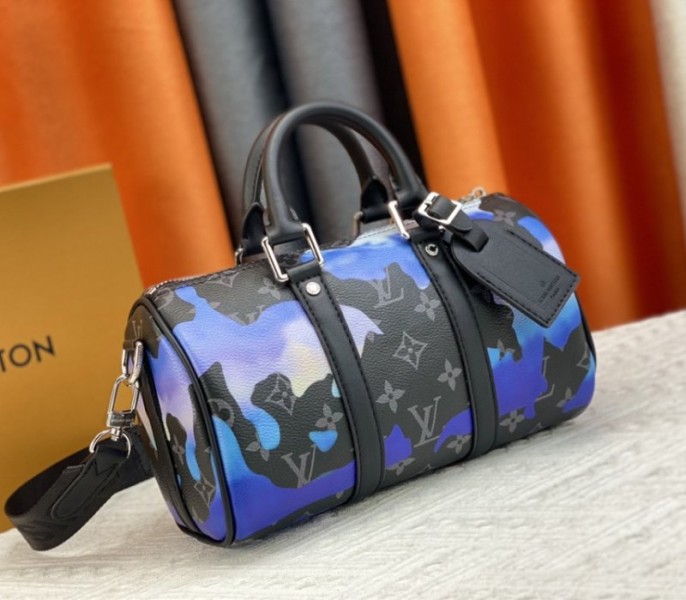 Louis Vuitton Monogram Eclipse Keepall Bandouliere 25 Travel Bag In Blue And Purple Sunrise