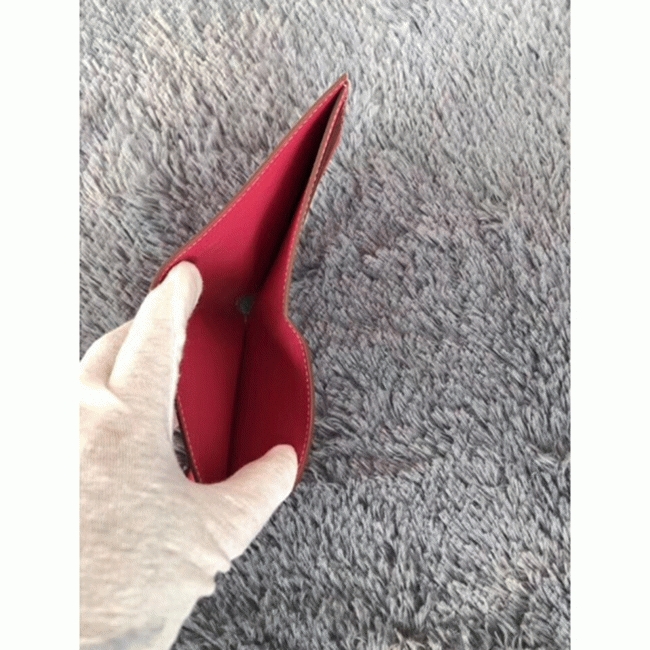 Rose red top fake Hermes Copernic compact wallet