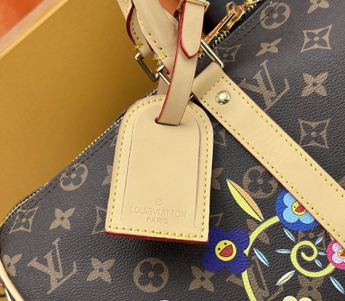 LV X TM Monogram Canvas Keepall Bandouliere 45
