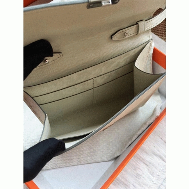 White top knockoff Hermes Clic wallet with strap