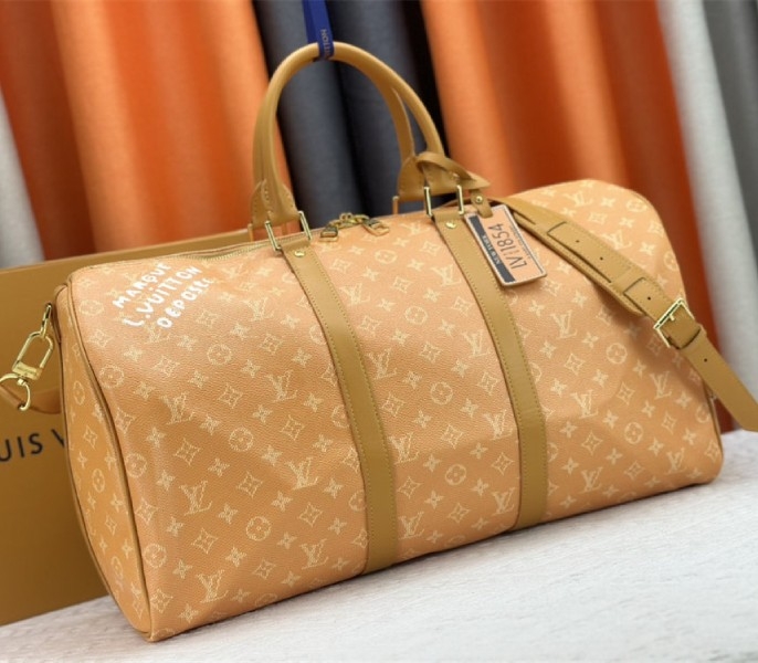 Louis Vuitton Monogram Heritage Canvas Keepall Bandouliere 50 In Yellow