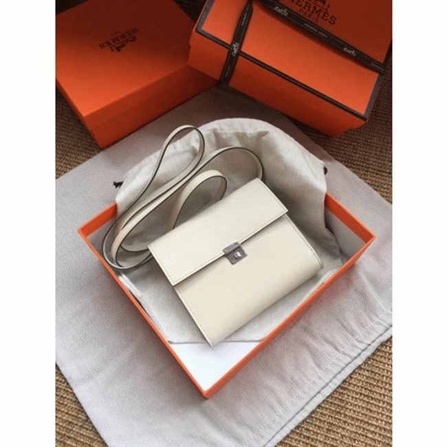 White top knockoff Hermes Clic wallet with strap