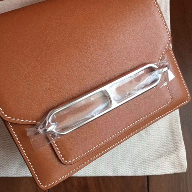 Caramel replica Hermes Mini Sac Roulis handbag
