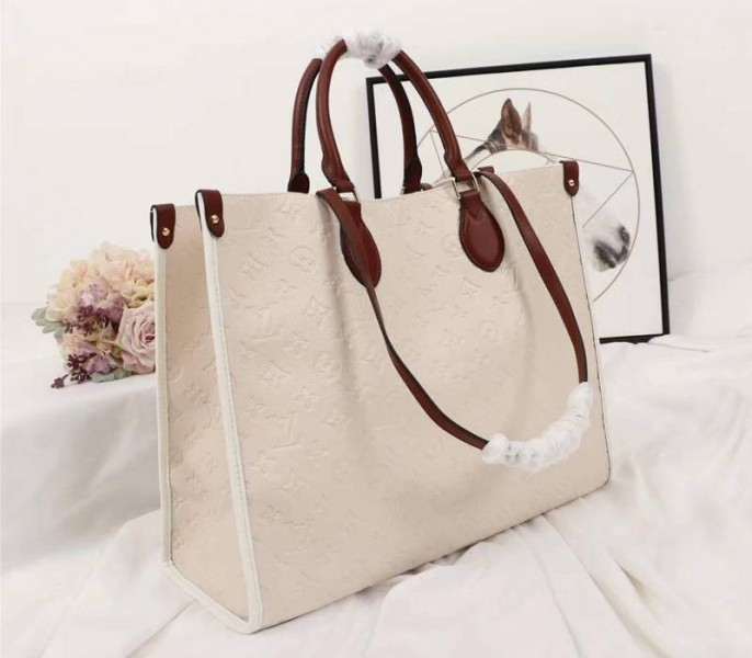 Louis Vuitton Monogram Empreinte Onthego GM Tote In Cream
