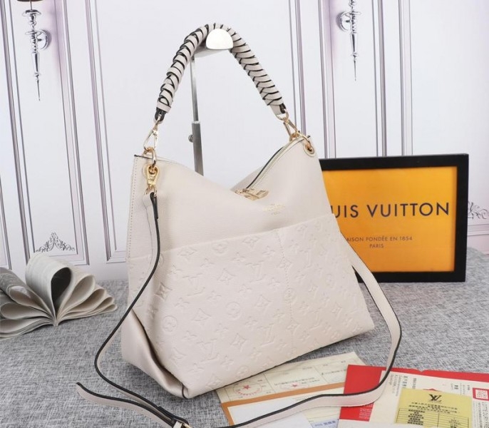 Louis Vuitton Monogram Empreinte Leather Maida Hobo In Cream
