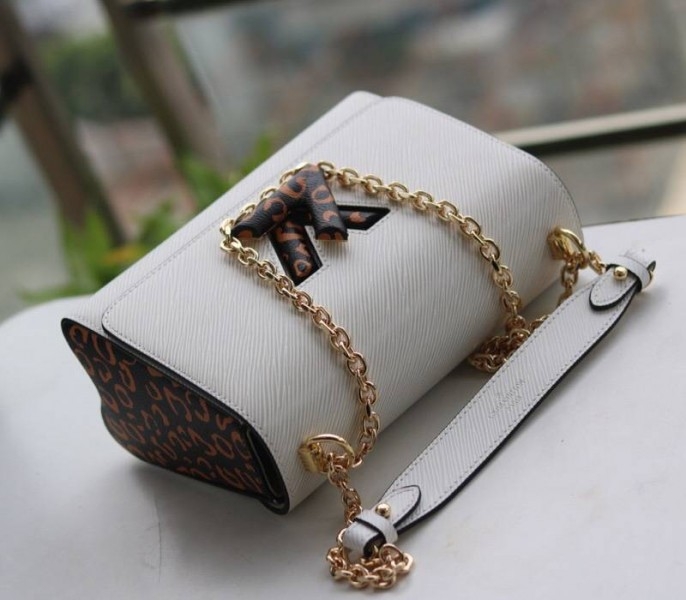 Louis Vuitton Epi Leather Jungle Edition Twist MM Bag In Optic White