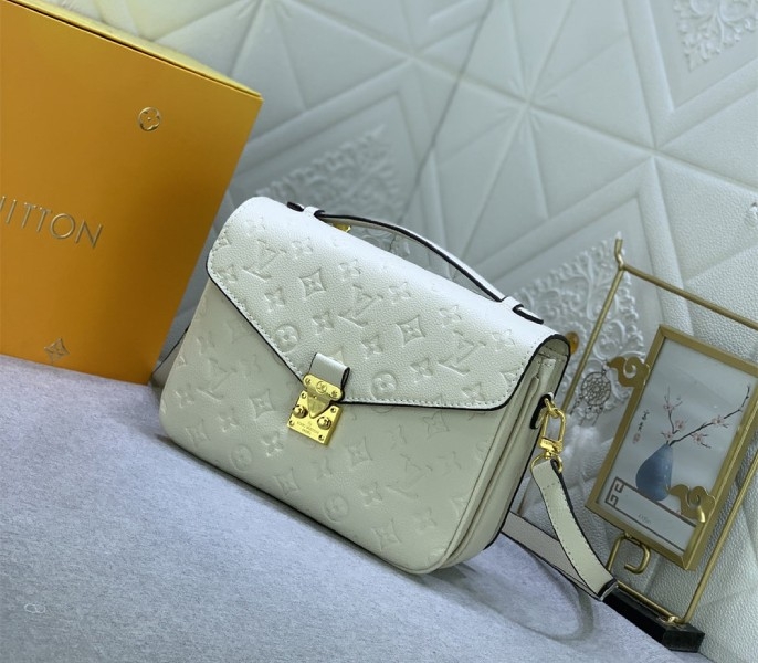 LV Monogram Empreinte Leather Metis In Cream M46552
