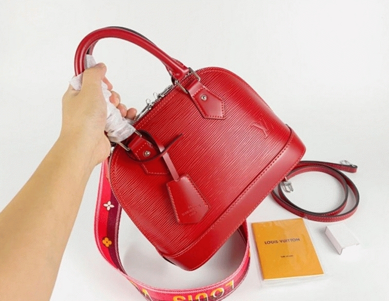 Louis Vuitton Epi Leather Alma BB Handbag In Red With Jacquard Strap