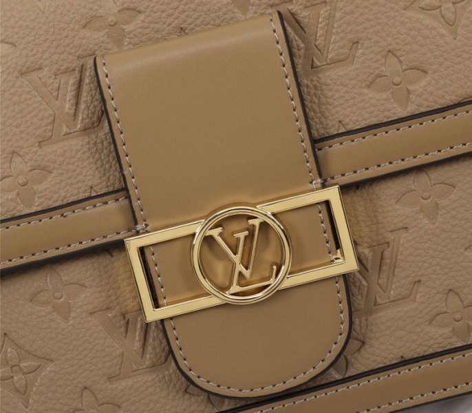 Louis Vuitton Monogram Empreinte Dauphine Bag In Brown