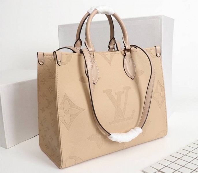 Louis Vuitton Monogram Empreinte Giant Onthego MM Bag In Beige