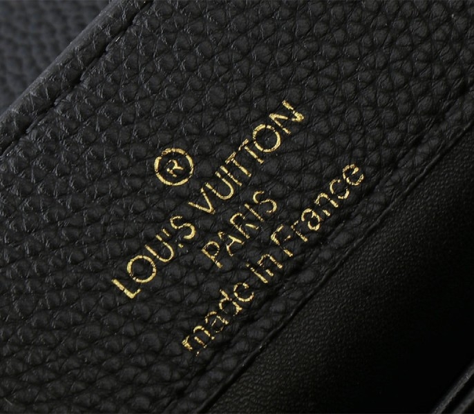 Louis Vuitton Capucines Mini Capucines Handbag In Black