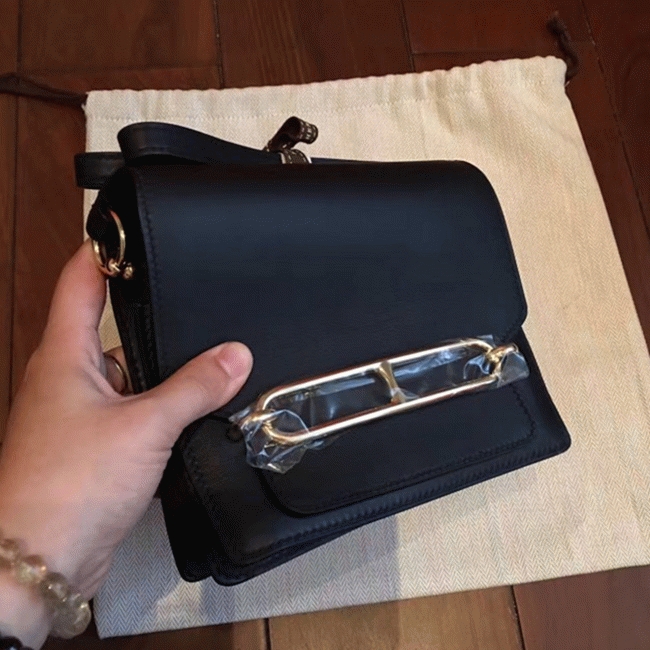 Black knockoff Hermes Mini Sac Roulis handbag