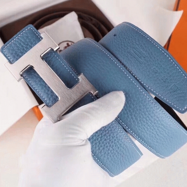Fake designer Hermes H belt buckle in blue shade