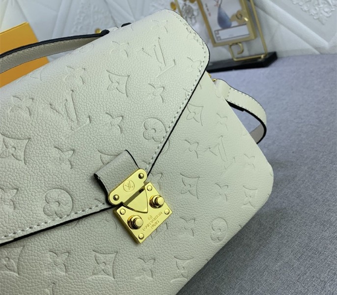 LV Monogram Empreinte Leather Metis In Cream M46552