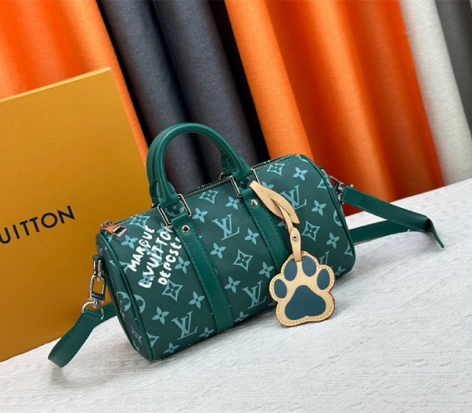 Louis Vuitton Monogram Heritage Canvas Keepall Bandouliere 25 In Green