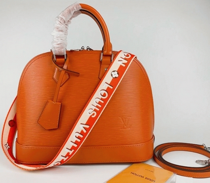 Louis Vuitton Epi Leather Alma PM Handbag In Orange With Jacquard Strap