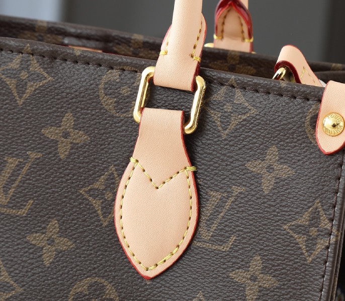 X TM Monogram Canvas Onthego PM