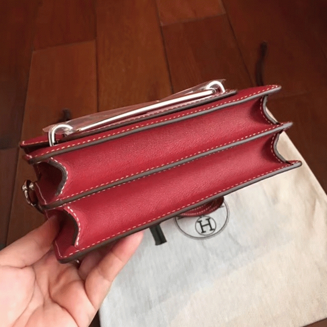 Red designer replica Hermes Mini Sac Roulis handbag