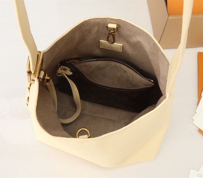 Louis Vuitton Low Key MM Hobo In Urban Yellow