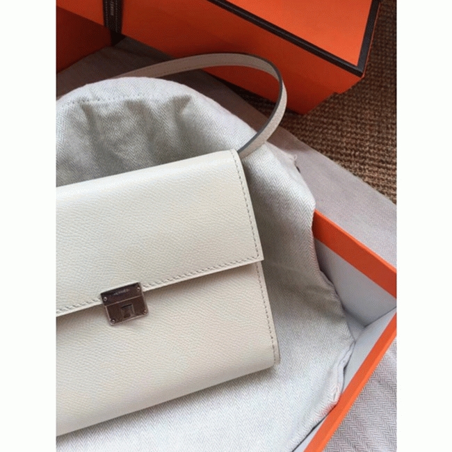 White top knockoff Hermes Clic wallet with strap