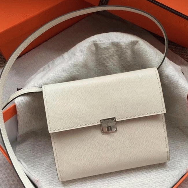 White top knockoff Hermes Clic wallet with strap