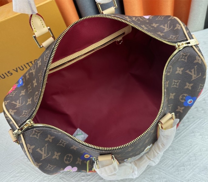 LV X TM Monogram Canvas Keepall Bandouliere 45