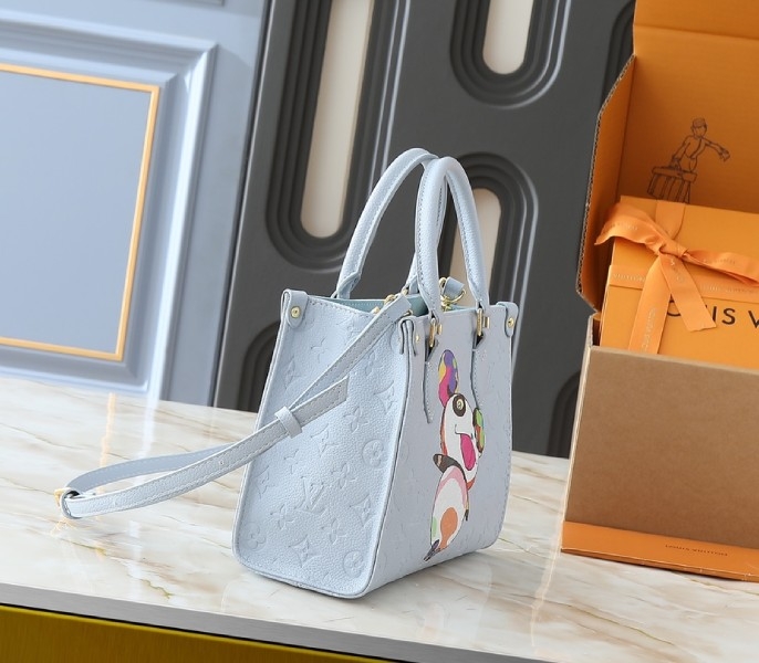 LV X TM Monogram Empreinte OnTheGo PM With Bijou Edition In Washed Blue