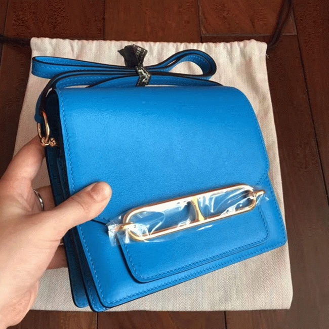Blue hydra luxury replica Hermes Mini Sac Roulis handbag