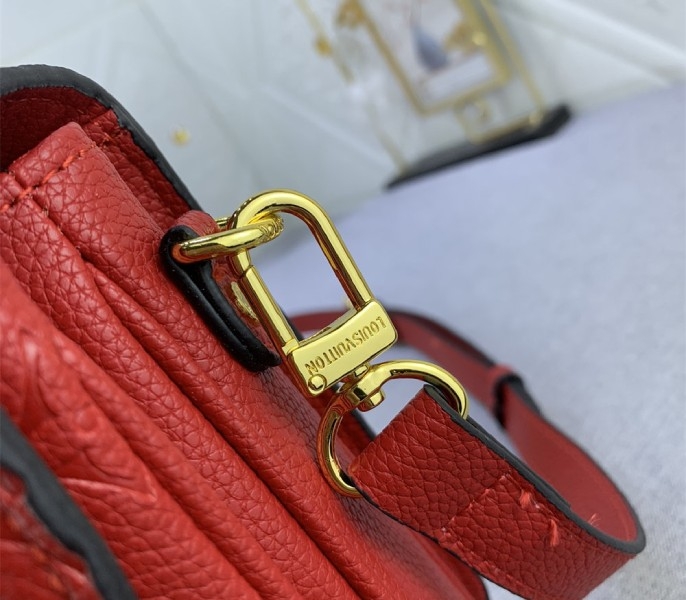 LV Monogram Empreinte Leather Metis In Red