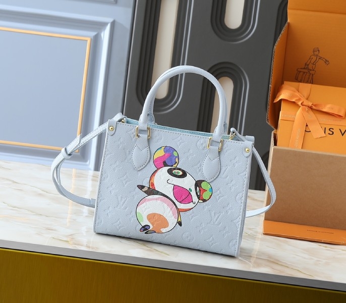 LV X TM Monogram Empreinte OnTheGo PM With Bijou Edition In Washed Blue