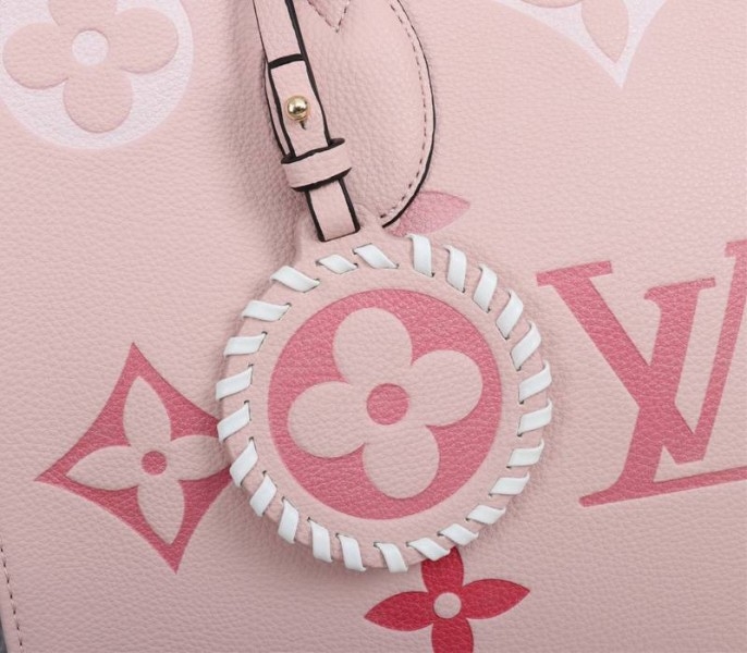 Louis Vuitton Monogram Empreinte Leather Onthego MM Bag In Pink